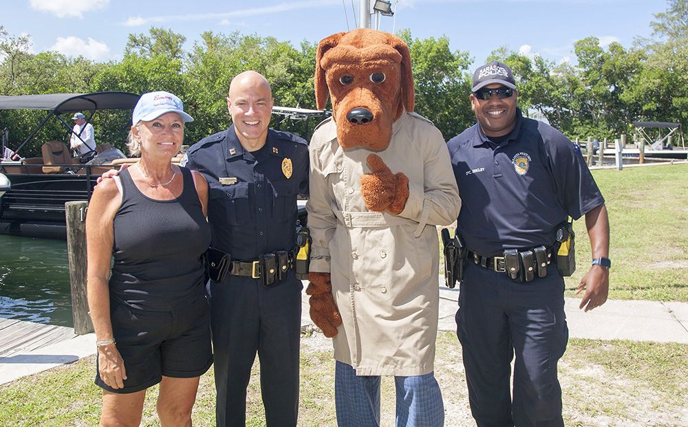McGruff the Crime Dog and some of Sarasota's finest at the Friendliest Catch Tournament.