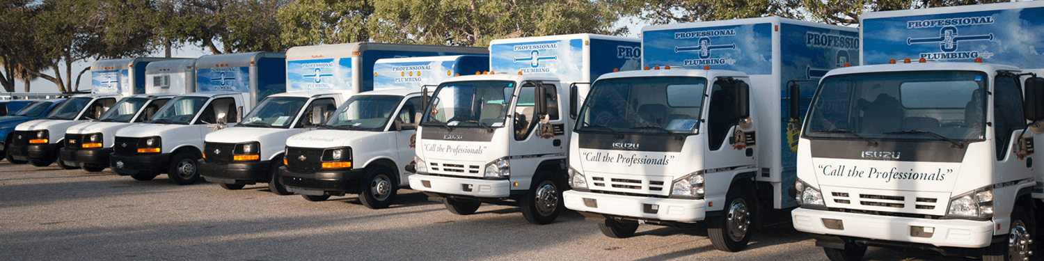 Professional Plumbing & Design trucks parked along Bayfront Park in Sarasota, Florida.